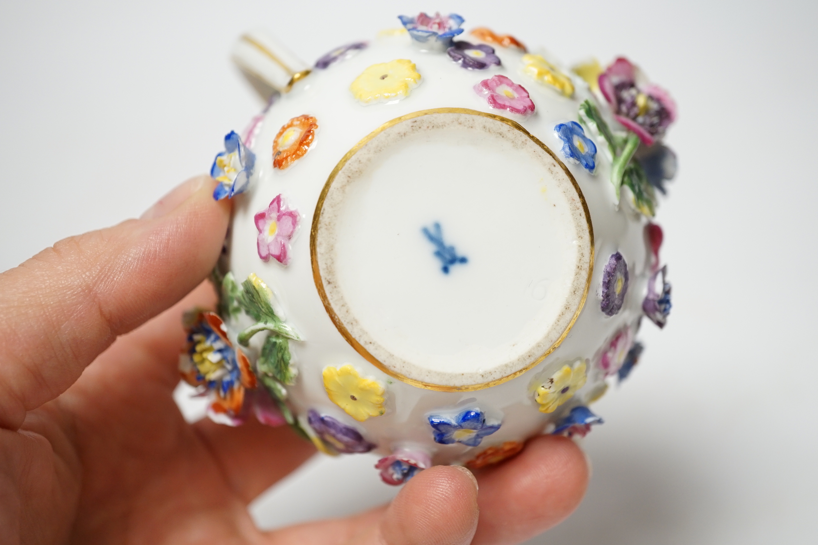 A miniature Meissen floral encrusted teapot, 7cm